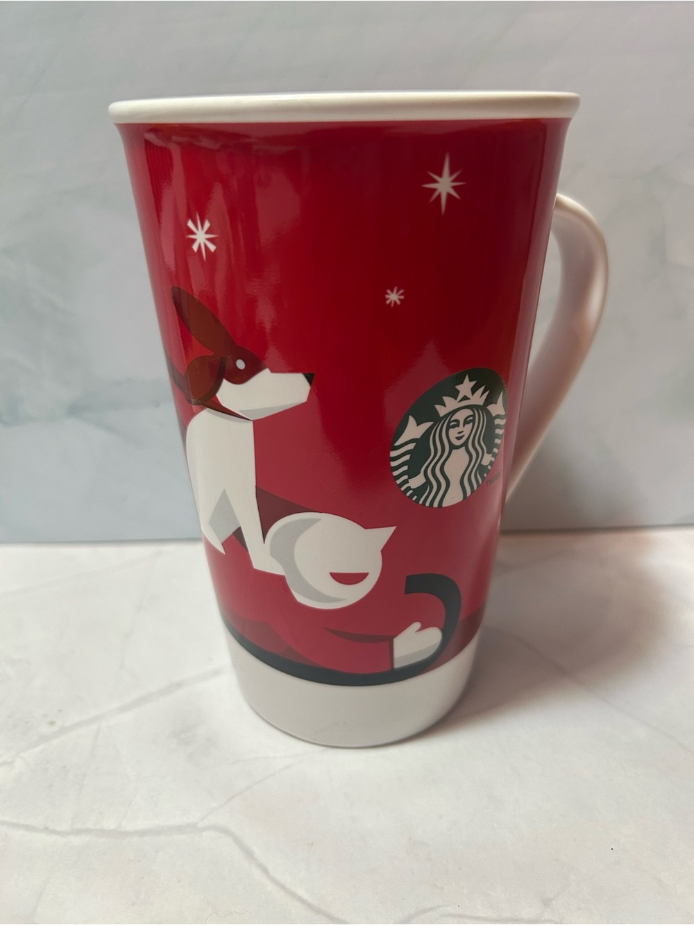 Starbucks Red and White Holiday Mug with Dog Illustration